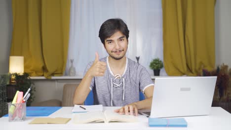Male-student-looking-at-camera-with-positive-and-positive-gesture.